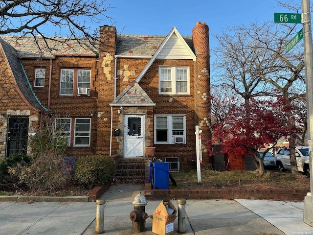 view of front of house with cooling unit