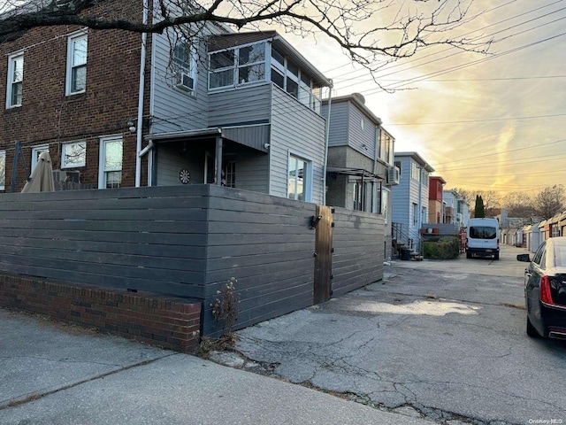 view of property exterior at dusk