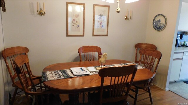 dining area with hardwood / wood-style floors