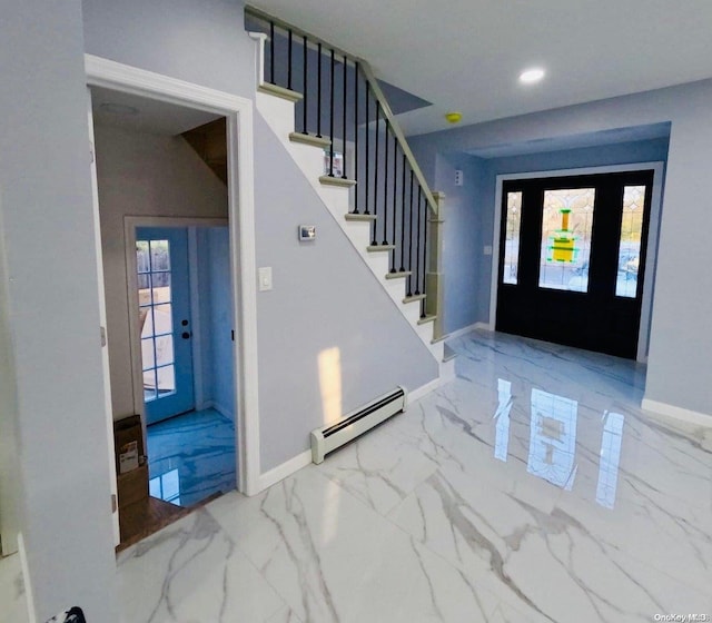 entryway with a baseboard heating unit