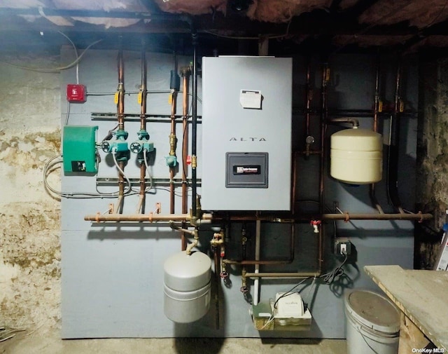 utility room featuring water heater