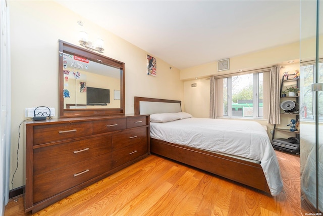 bedroom featuring light wood-type flooring