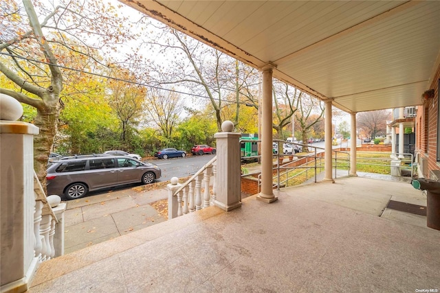 view of patio featuring a porch