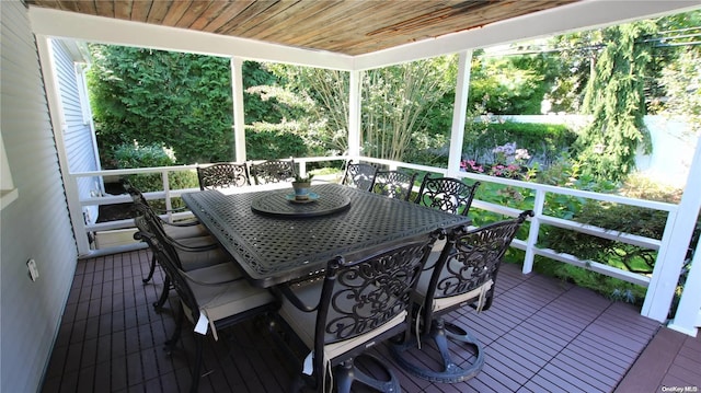 sunroom / solarium with wood ceiling