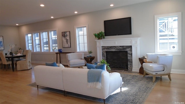 80 Albany Blvd, Atlantic Beach, NY 11509 - living area featuring light wood-style floors, recessed lighting, a fireplace, and baseboards