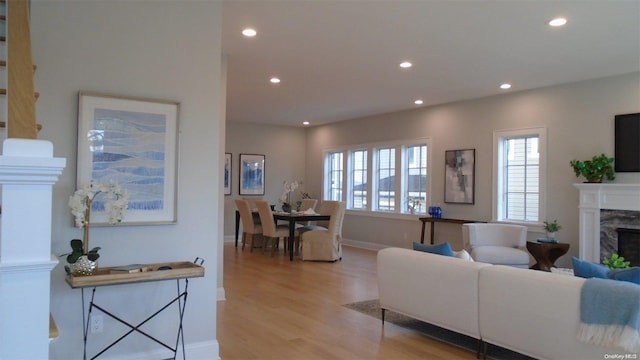80 Albany Blvd, Atlantic Beach, NY 11509 - living area with light wood-style floors, recessed lighting, a high end fireplace, and baseboards