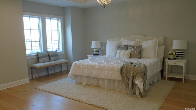 bedroom featuring wood-type flooring