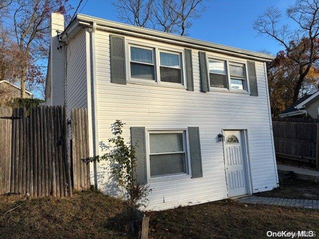59 Port Washington Ave, Sound Beach, NY 11789 - view of front of property with a chimney