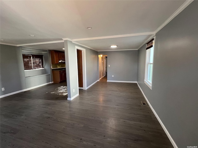 unfurnished living room featuring dark hardwood / wood-style flooring and crown molding