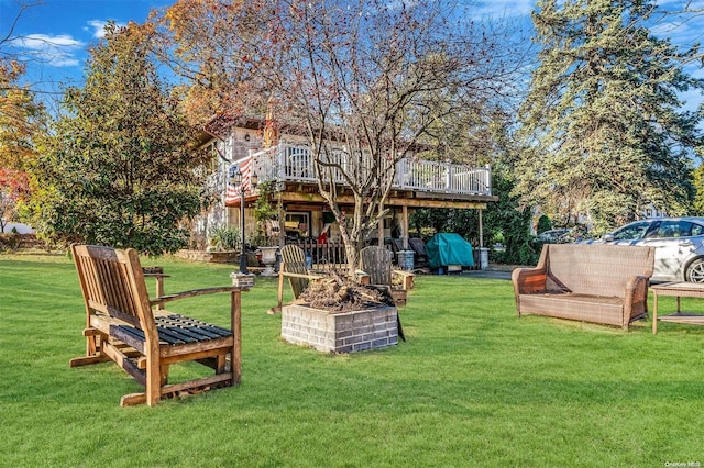 view of yard featuring a wooden deck