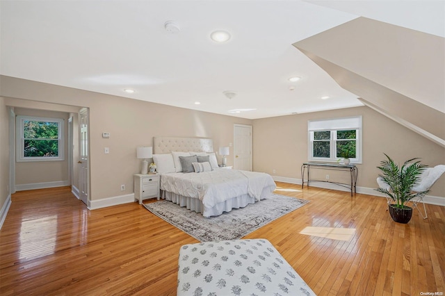 bedroom with light hardwood / wood-style floors