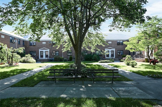 view of community with a lawn