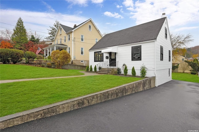 view of front property with a front yard