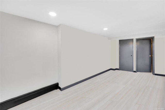 unfurnished bedroom featuring light wood-type flooring