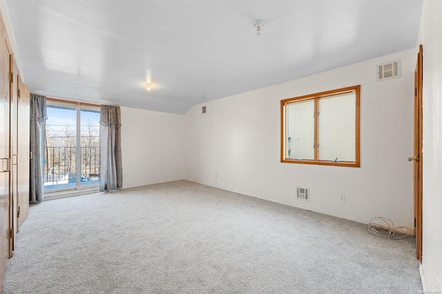 unfurnished room with light carpet