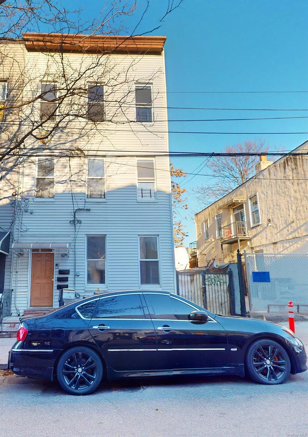 60-17 54th Pl, Maspeth, NY 11378 - view of townhome / multi-family property