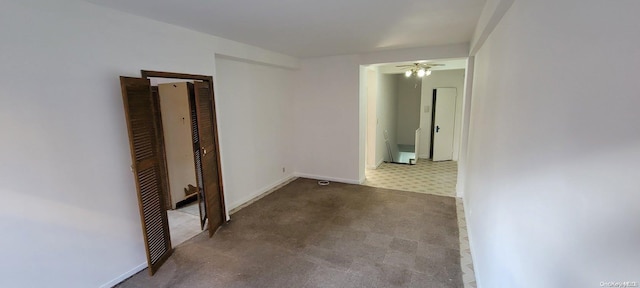 hallway with carpet floors