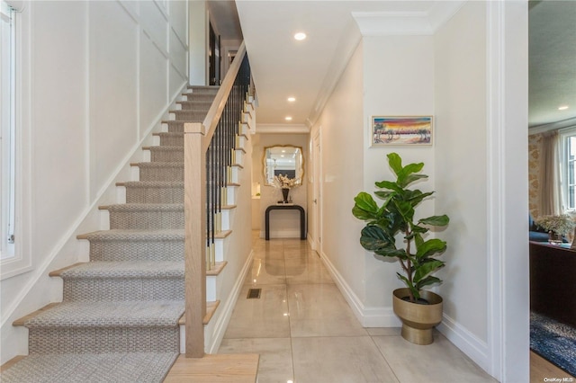 interior space featuring ornamental molding