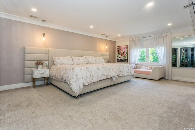 bedroom featuring crown molding and light carpet