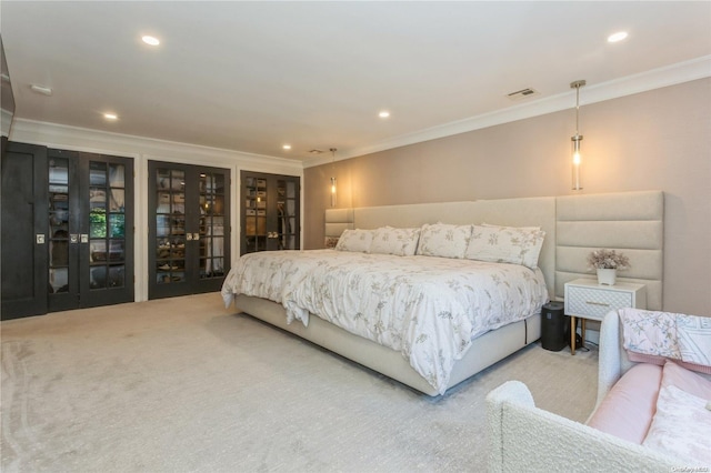 carpeted bedroom featuring french doors and ornamental molding