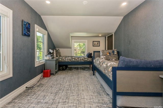 bedroom featuring vaulted ceiling