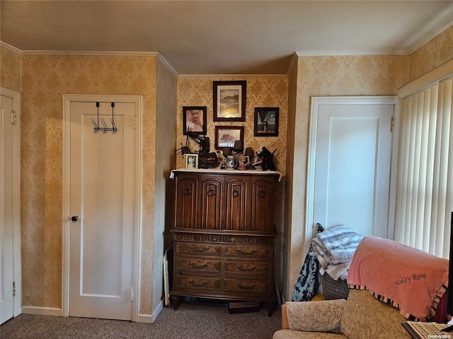 sitting room featuring crown molding and carpet