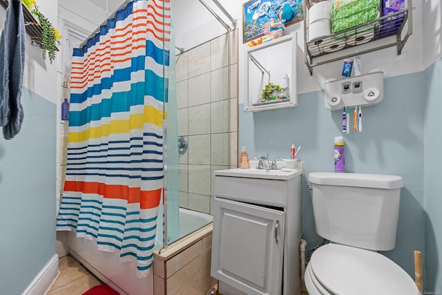 full bathroom with toilet, tile patterned flooring, vanity, and shower / bath combo with shower curtain