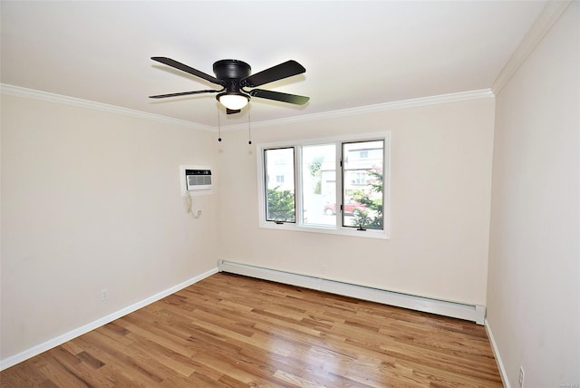 spare room with a baseboard radiator, light wood finished floors, ornamental molding, a wall mounted AC, and baseboards