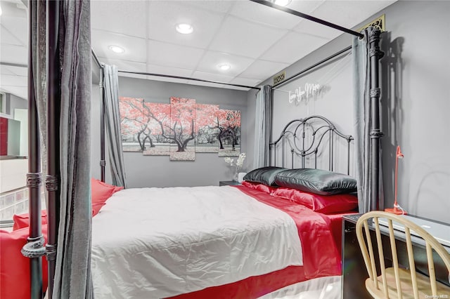 bedroom featuring a paneled ceiling