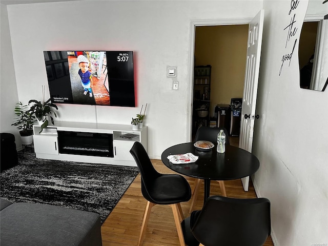 dining area featuring wood-type flooring