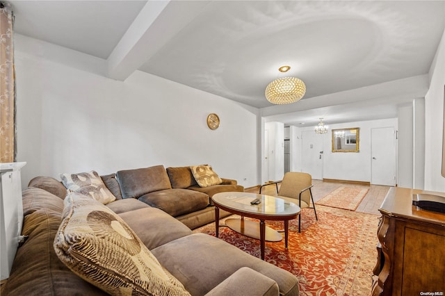 living room featuring a chandelier, beamed ceiling, and wood-type flooring