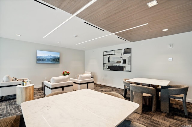 living room featuring wooden ceiling and dark wood-type flooring