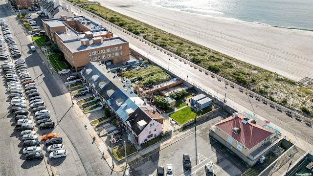 aerial view featuring a beach view and a water view