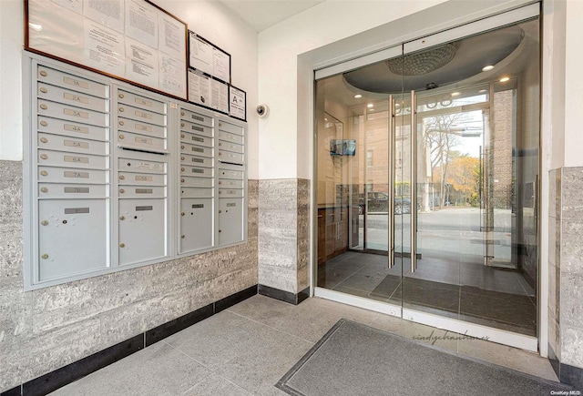 95-08 65th Rd Unit 7A, Rego Park, NY 11374 - surrounding community featuring mail area, a wainscoted wall, and tile walls