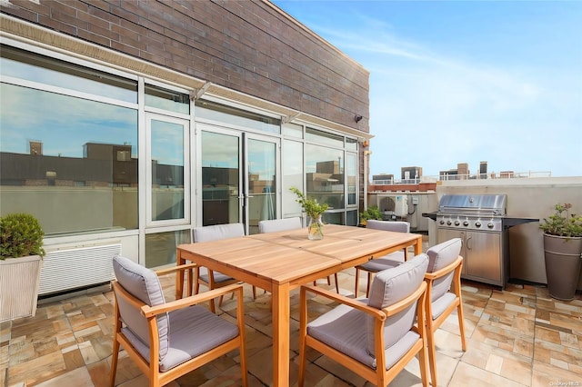 view of patio featuring a grill