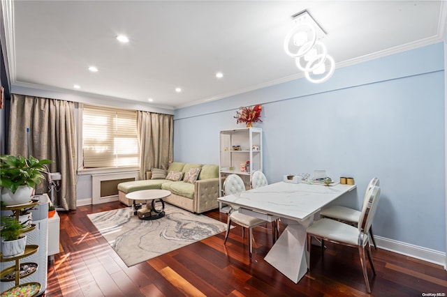 dining space featuring dark hardwood / wood-style floors and ornamental molding