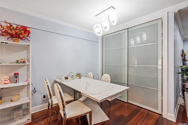 dining area featuring dark hardwood / wood-style flooring and crown molding