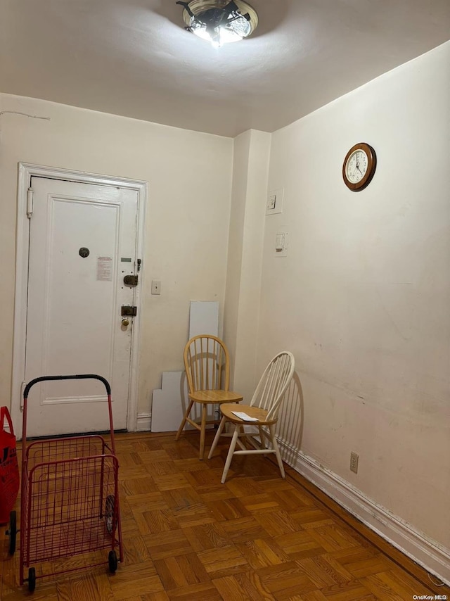 interior space with dark parquet floors