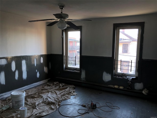 spare room with ceiling fan and hardwood / wood-style floors