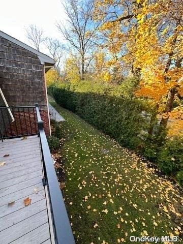 view of yard with a wooden deck