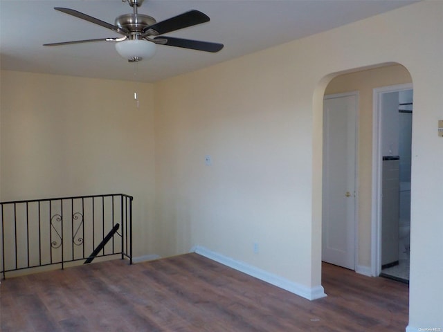 spare room featuring ceiling fan and wood-type flooring