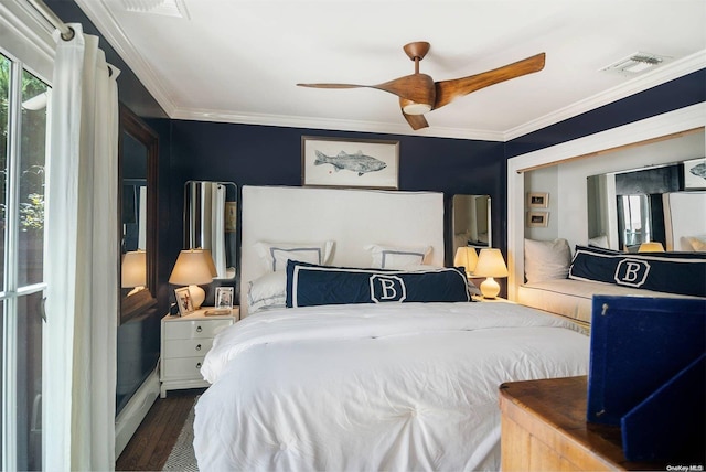 bedroom featuring crown molding, ceiling fan, and dark wood-type flooring