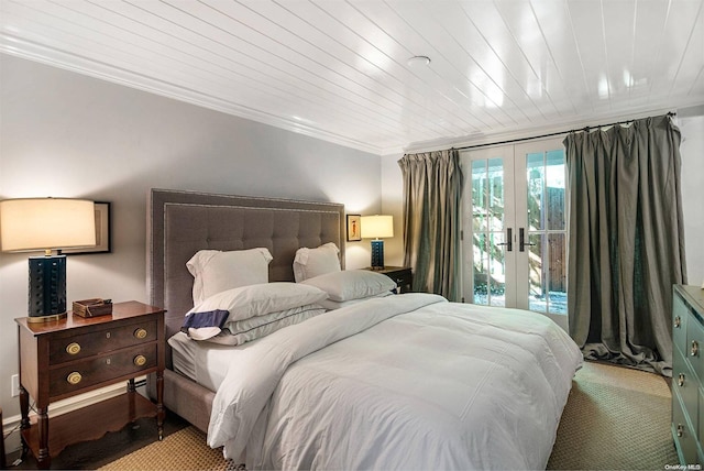 bedroom featuring access to exterior, wooden ceiling, crown molding, and french doors