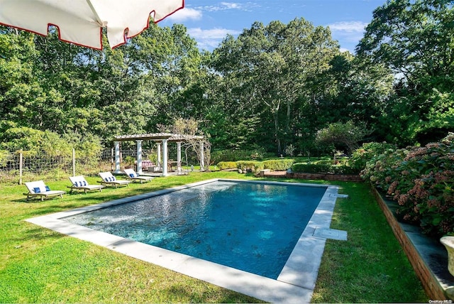 view of swimming pool featuring a pergola and a yard