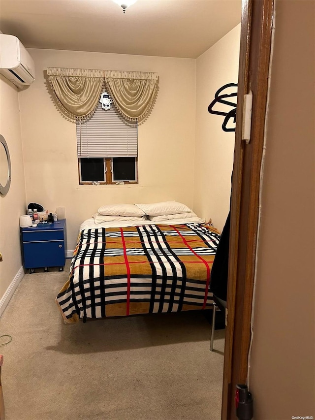 carpeted bedroom featuring an AC wall unit