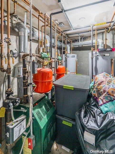 utility room featuring gas water heater