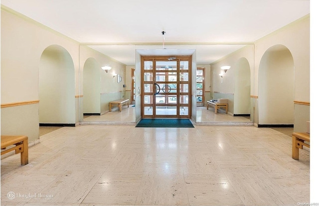 foyer with ornamental molding