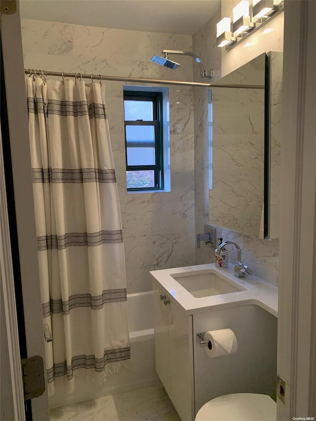 bathroom featuring vanity, shower / bathtub combination with curtain, and tile walls