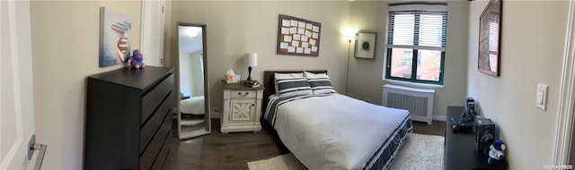 bedroom featuring radiator heating unit