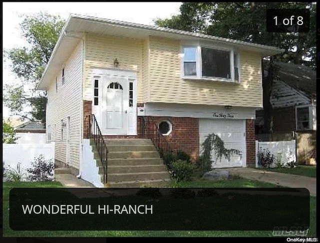 view of front of home with a garage